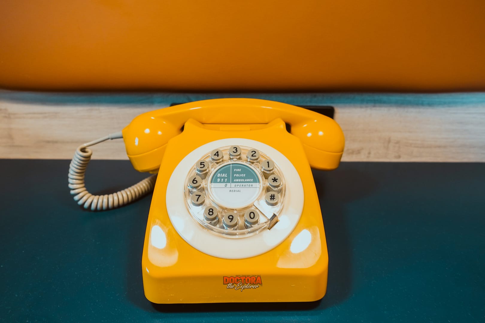 Hotel Denim - yellow rotary phone to add a nice pop of color