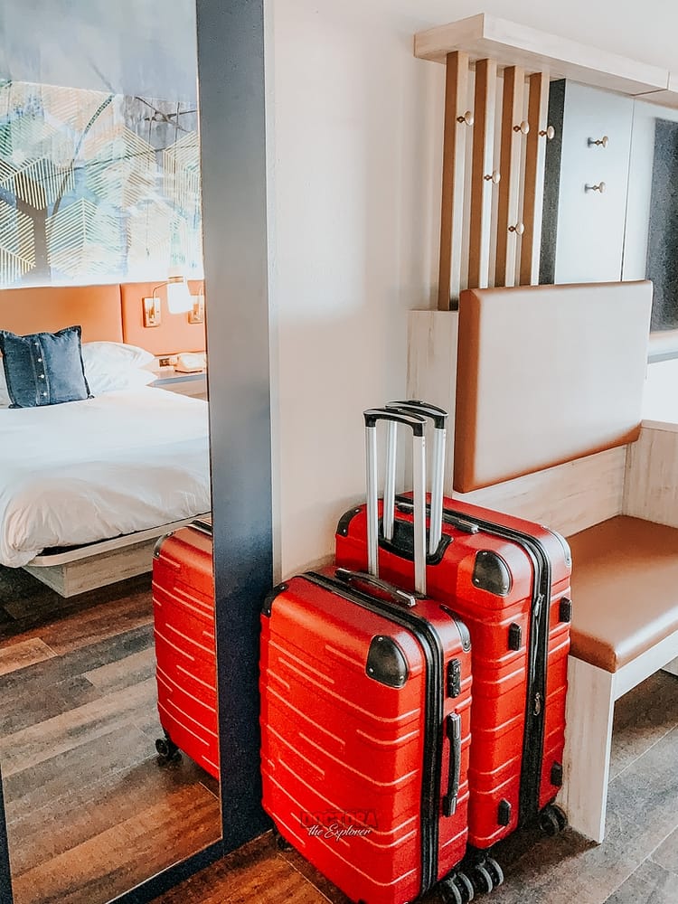 Hotel Denim - luggage and full body mirror